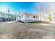 Ranch style home with large yard and mature trees at 902 Cobb Ct, Sanford, NC 27330