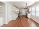 Modern kitchen with white cabinets, stainless steel appliances, and marble backsplash at 902 Cobb Ct, Sanford, NC 27330