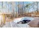 Above ground pool on wooden deck with surrounding trees at 902 Cobb Ct, Sanford, NC 27330
