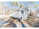 Cute cottage with front porch and wood siding at 902 Cobb Ct, Sanford, NC 27330