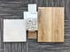 Showcasing various flooring samples including tile, granite and wood for customizable home interiors at 937 Selby Ave, Durham, NC 27713