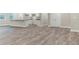 Spacious living area with wood-look flooring and an open concept design at Lot 14H Poppy Mallow Ln, Oxford, NC 27565