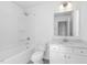 Clean, well-lit bathroom with a shower, tub, and ample storage space at 100 Sequoia Dr # 2387, Louisburg, NC 27549