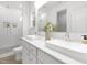 Modern bathroom with dual sinks, quartz countertop, and luxurious walk-in shower at 100 Sequoia Dr # 2387, Louisburg, NC 27549