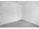 A bright bedroom with a neutral gray carpet and a white door, ready for personalization at 100 Sequoia Dr # 2387, Louisburg, NC 27549