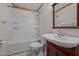 Clean bathroom with a tub, toilet and vanity at 1018 Lakeview Dr, Cedar Grove, NC 27231