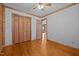 Bedroom with wood floors and closet at 1018 Lakeview Dr, Cedar Grove, NC 27231