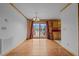 Bright dining room with hardwood floors and sliding glass doors leading to a deck at 1018 Lakeview Dr, Cedar Grove, NC 27231