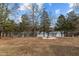 Lakefront property with fire pit area at 1018 Lakeview Dr, Cedar Grove, NC 27231