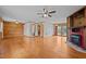 Spacious living room with hardwood floors and wood walls at 1018 Lakeview Dr, Cedar Grove, NC 27231