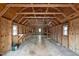 Bright interior of a wooden shed with built-in shelving at 1018 Lakeview Dr, Cedar Grove, NC 27231