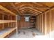 Interior of a spacious wooden shed with built-in shelving at 1018 Lakeview Dr, Cedar Grove, NC 27231