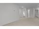 Carpeted hallway with doors to bedrooms and bathroom at 1025 Middlecrest Dr, Rocky Mount, NC 27804