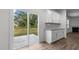 Kitchen features white cabinets and granite countertops at 1025 Middlecrest Dr, Rocky Mount, NC 27804