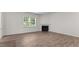 Living room with corner fireplace and wood-look floors at 1025 Middlecrest Dr, Rocky Mount, NC 27804