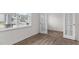 Bright office with wood-look floors and French doors at 1025 Middlecrest Dr, Rocky Mount, NC 27804