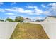 Wide fenced in backyard offering ample space and privacy, with grass at 108 Bonnie Girl Ct, Lillington, NC 27546