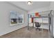 Modern bedroom features a loft bed, desk and a view to the outside at 108 Bonnie Girl Ct, Lillington, NC 27546