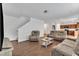 Open-concept living area seamlessly flows into the kitchen, ideal for entertaining and Gathering gatherings at 108 Bonnie Girl Ct, Lillington, NC 27546