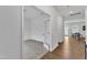 Office space with gray carpet, white walls, and view into dining room through glass french doors at 108 Bonnie Girl Ct, Lillington, NC 27546