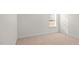 Spacious bedroom with window and carpet flooring at 1104 Middlecrest Dr, Rocky Mount, NC 27804