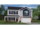 Two-story house with gray and blue siding, a brick bottom, and a two-car garage at 1104 Middlecrest Dr, Rocky Mount, NC 27804