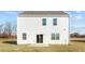 Two-story house exterior with white siding and a patio at 1104 Middlecrest Dr, Rocky Mount, NC 27804