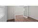 Bright office with wood-look floors and French doors at 1104 Middlecrest Dr, Rocky Mount, NC 27804