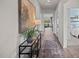 Bright hallway with hardwood floors and views into living room and bedroom at 1113 Middlecrest Dr, Rocky Mount, NC 27804