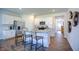 Modern kitchen with white cabinets, granite counters, and an island at 1116 Middlecrest Dr, Rocky Mount, NC 27804