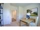 Bright home office with built-in shelving and view of another room at 1116 Middlecrest Dr, Rocky Mount, NC 27804