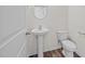 Simple yet elegant powder room with pedestal sink and toilet at 1121 Middlecrest Dr, Rocky Mount, NC 27804