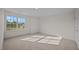 Bright bedroom with carpeted floor and large window at 1121 Middlecrest Dr, Rocky Mount, NC 27804