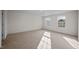 Spacious bedroom with carpeted floor and large windows at 1121 Middlecrest Dr, Rocky Mount, NC 27804