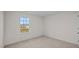 Simple bedroom with carpeted floor and window at 1121 Middlecrest Dr, Rocky Mount, NC 27804