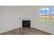 Corner fireplace with white mantel in a Gathering room at 1121 Middlecrest Dr, Rocky Mount, NC 27804
