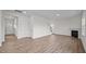 Open concept Gathering room with fireplace and wood-look floors at 1121 Middlecrest Dr, Rocky Mount, NC 27804