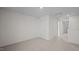 Upstairs hallway with carpeted floor and doors to bedrooms at 1121 Middlecrest Dr, Rocky Mount, NC 27804