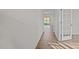 Bright hallway with light walls and wood-look flooring at 1121 Middlecrest Dr, Rocky Mount, NC 27804