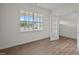 Bright home office with large window and wood-look floors at 1121 Middlecrest Dr, Rocky Mount, NC 27804