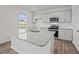 Modern kitchen featuring granite countertops and stainless steel appliances at 1121 Middlecrest Dr, Rocky Mount, NC 27804