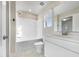 Clean bathroom with white vanity, bathtub, and tiled floor at 1134 Chestnut Bluff, Apex, NC 27502