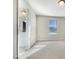 Bright bedroom with plush carpeting and access to bathroom at 1134 Chestnut Bluff, Apex, NC 27502