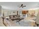 Open living space with a large sectional sofa and adjacent kitchen at 116 Rosebud Lane Ln, Durham, NC 27704