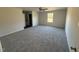 Large bedroom featuring a ceiling fan and window at 148 Phil Jack Rd, Dunn, NC 28334