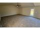 Bright living area with carpet and access to backyard at 148 Phil Jack Rd, Dunn, NC 28334