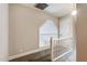 Upper hallway with a unique arched window and white railing at 1500 Treetop Ln, Rocky Mount, NC 27804