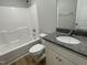 Bathroom with shower/tub combo and granite vanity at 158 Pate Landing Dr, Selma, NC 27576