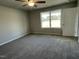 Simple bedroom with grey carpet and ceiling fan at 158 Pate Landing Dr, Selma, NC 27576