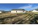 Exterior view of house with vinyl siding and yard at 158 Pate Landing Dr, Selma, NC 27576